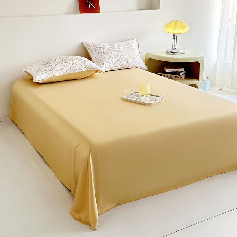  The light yellow bed sheet