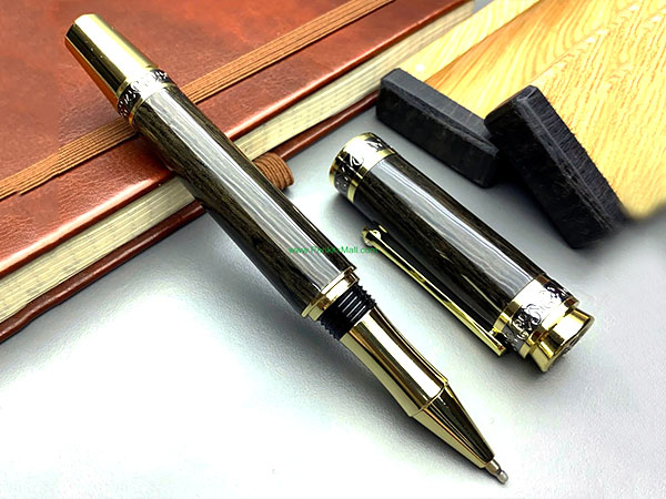 Wooden pen made of bog oak.
