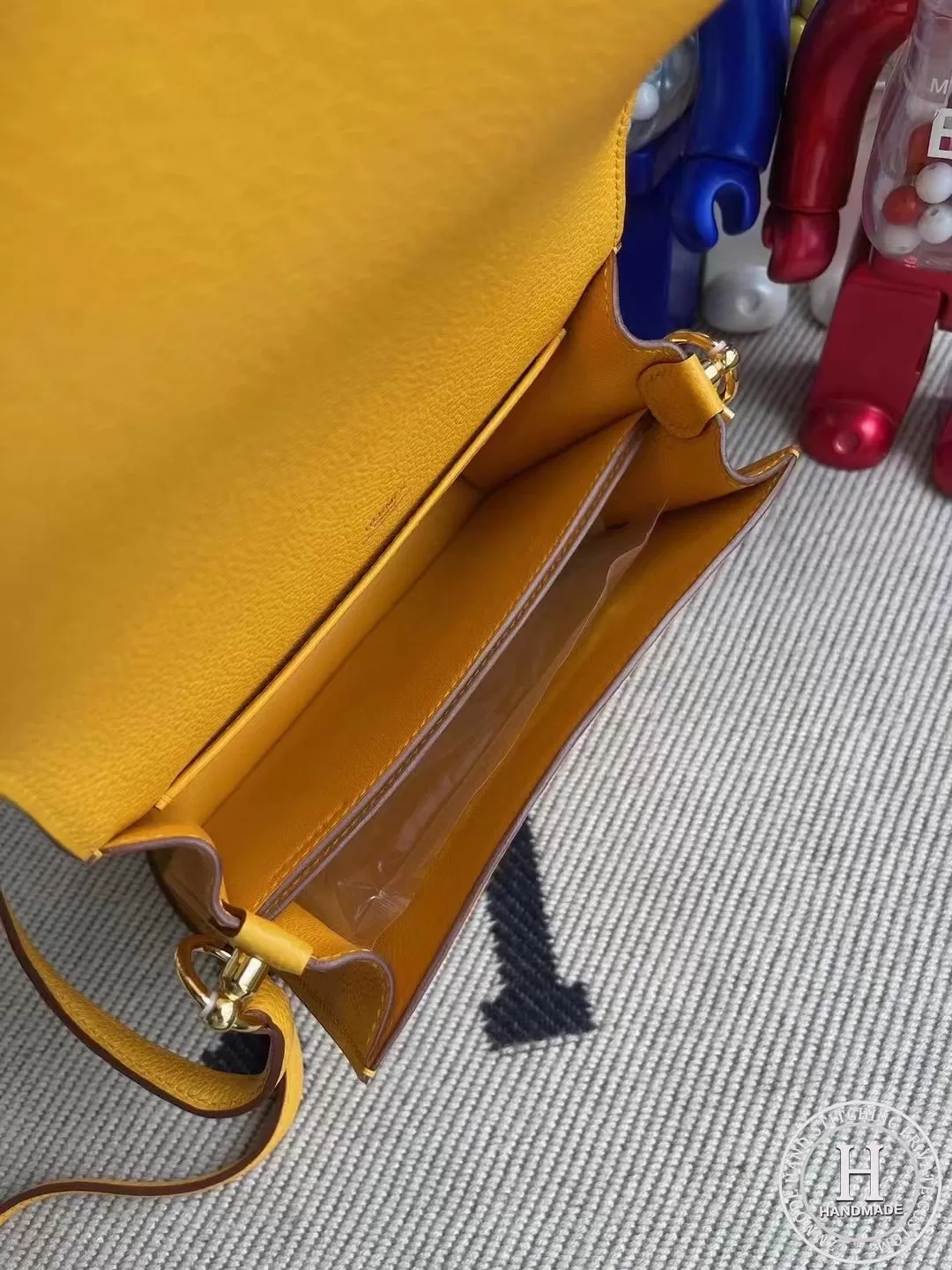 Hermes Roulis Mini Evercolor 9D Jaune Amber Hermes Roulis Mini Evercolor 9D Jaune Amber