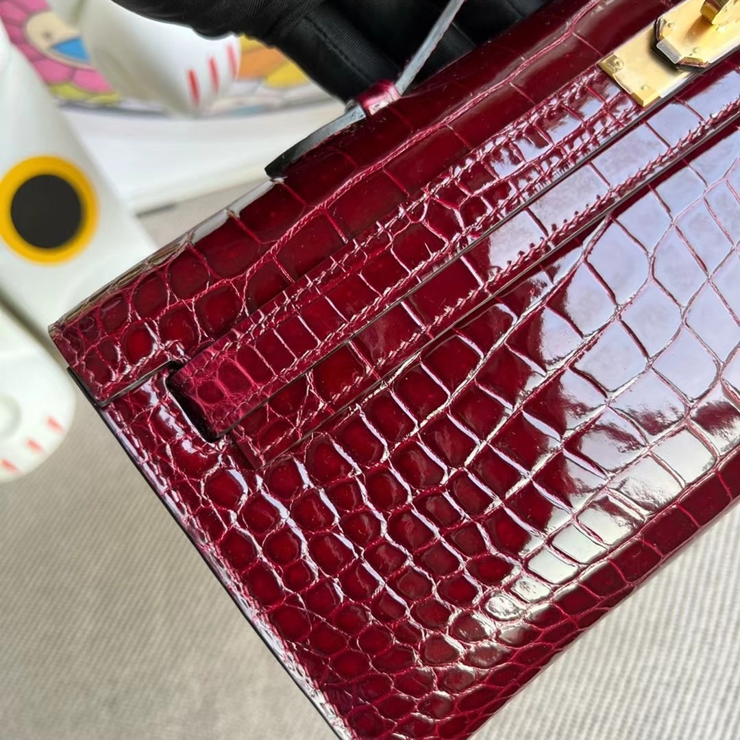 HERMES KELLY CUT 31CM F5 BOURGOGNE GHW SHINY POROSUS CROCODILE HERMES KELLY CUT 31CM F5 BOURGOGNE GHW SHINY POROSUS CROCODILE