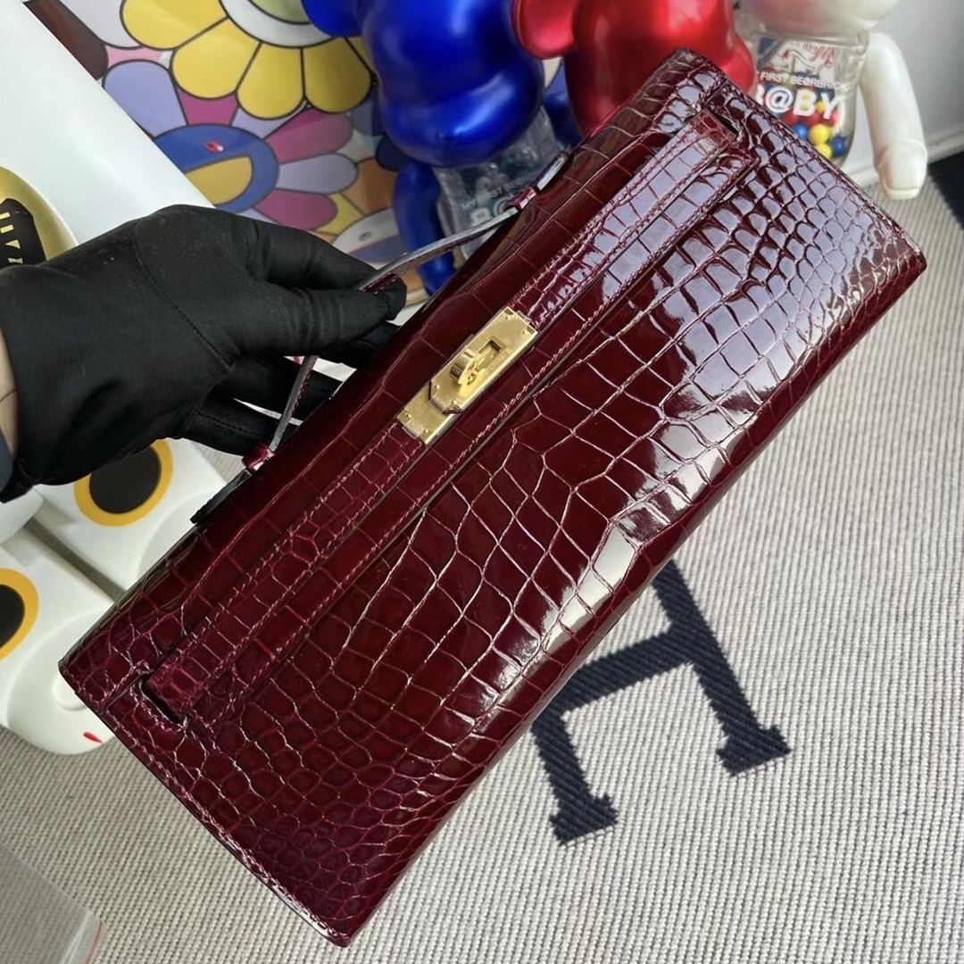 HERMES KELLY CUT 31CM F5 BOURGOGNE GHW SHINY POROSUS CROCODILE HERMES KELLY CUT 31CM F5 BOURGOGNE GHW SHINY POROSUS CROCODILE