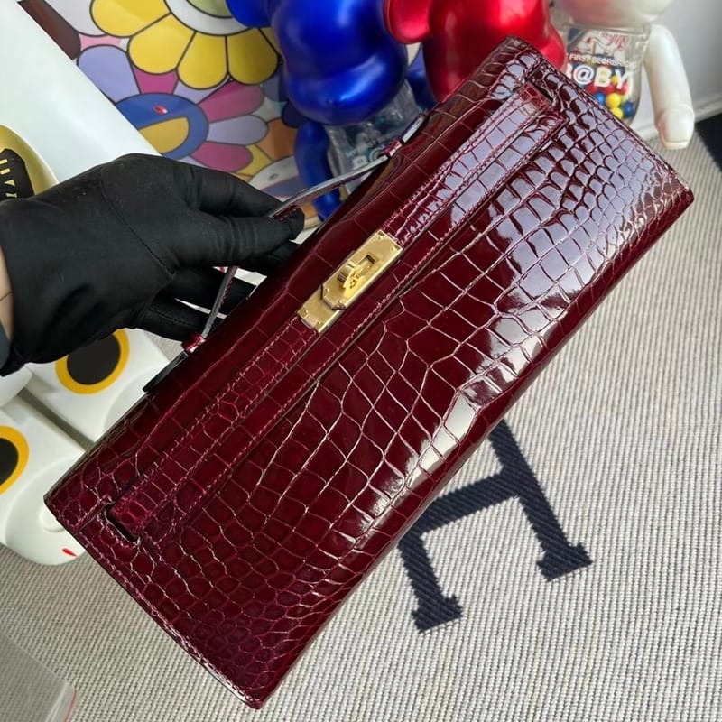 HERMES KELLY CUT 31CM F5 BOURGOGNE GHW SHINY POROSUS CROCODILE