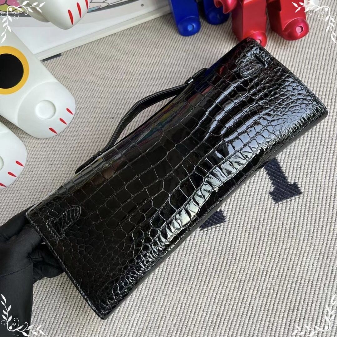 HERMES KELLY CUT 31CM 89 NOIR SHINY POROSUS CROCODILE GHW HERMES KELLY CUT 31CM 89 NOIR SHINY POROSUS CROCODILE GHW