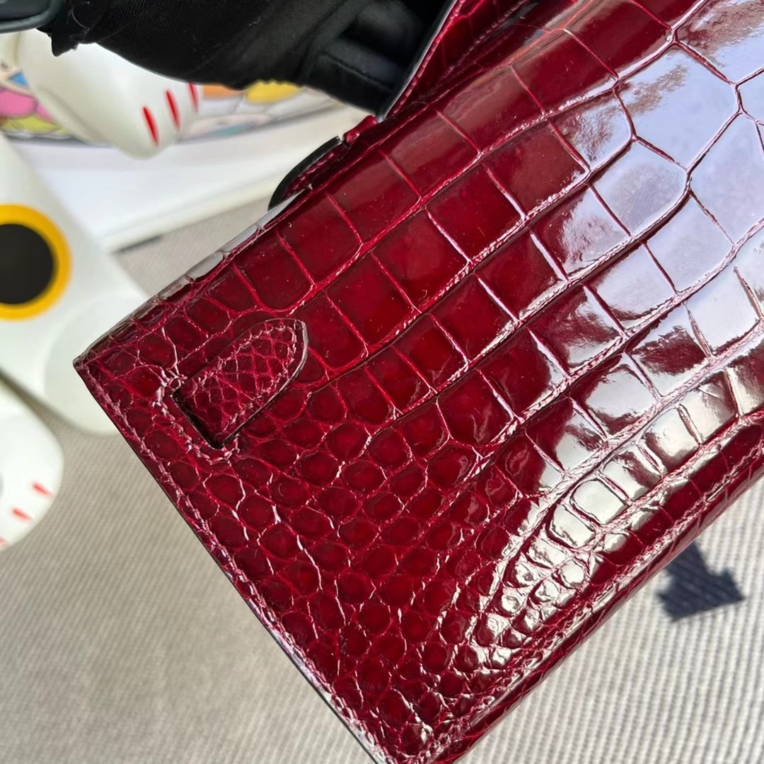 HERMES KELLY CUT 31CM F5 BOURGOGNE GHW SHINY POROSUS CROCODILE HERMES KELLY CUT 31CM F5 BOURGOGNE GHW SHINY POROSUS CROCODILE