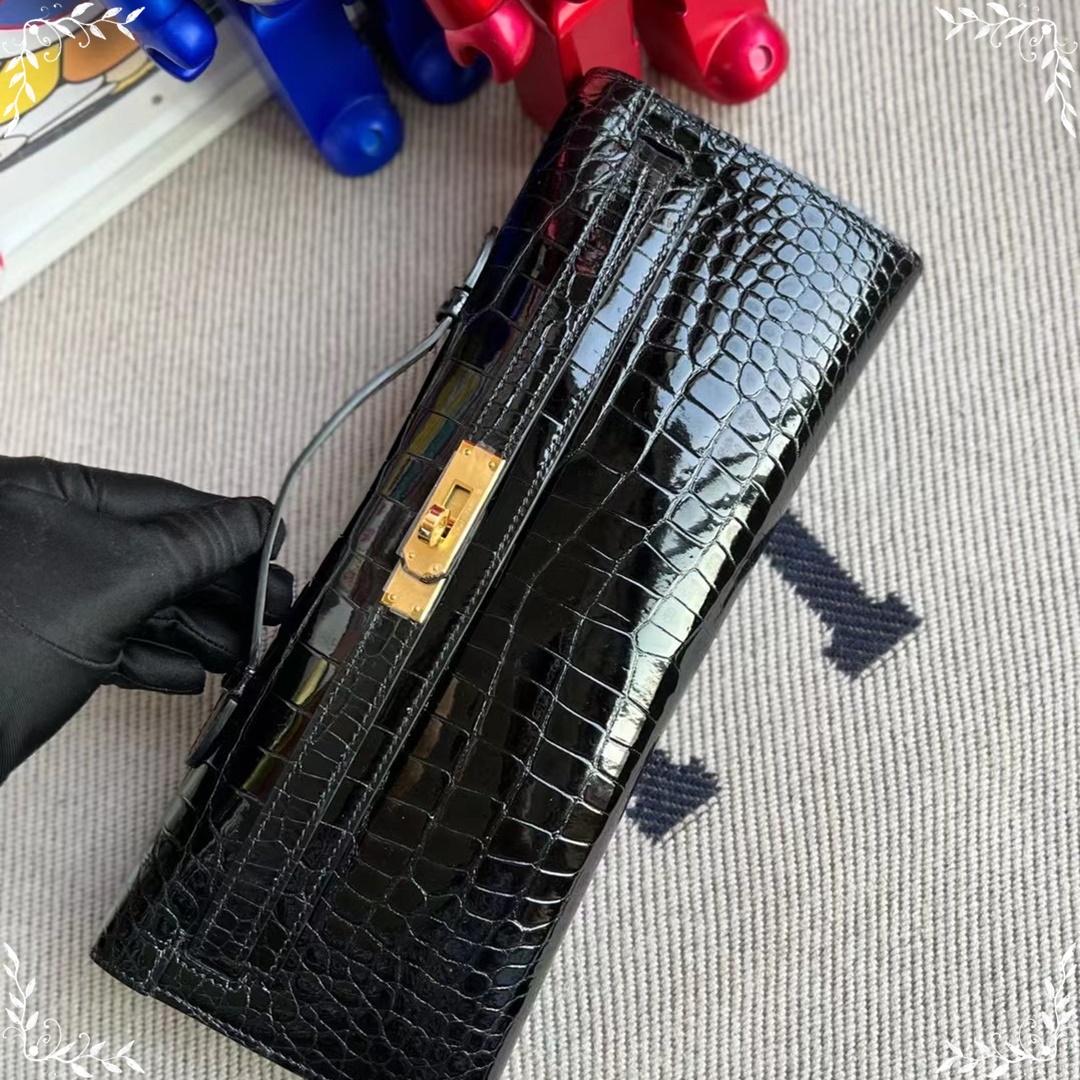 HERMES KELLY CUT 31CM 89  NOIR SHINY POROSUS CROCODILE GHW