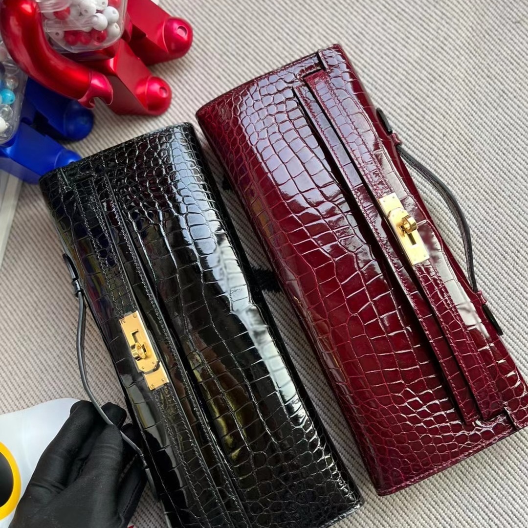 HERMES KELLY CUT 31CM F5 BOURGOGNE GHW SHINY POROSUS CROCODILE HERMES KELLY CUT 31CM F5 BOURGOGNE GHW SHINY POROSUS CROCODILE