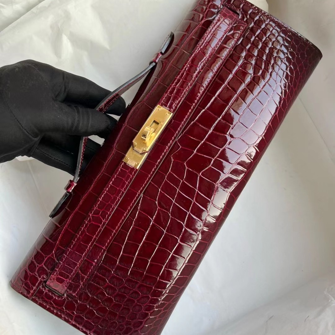 HERMES KELLY CUT 31CM F5 BOURGOGNE GHW SHINY POROSUS CROCODILE HERMES KELLY CUT 31CM F5 BOURGOGNE GHW SHINY POROSUS CROCODILE