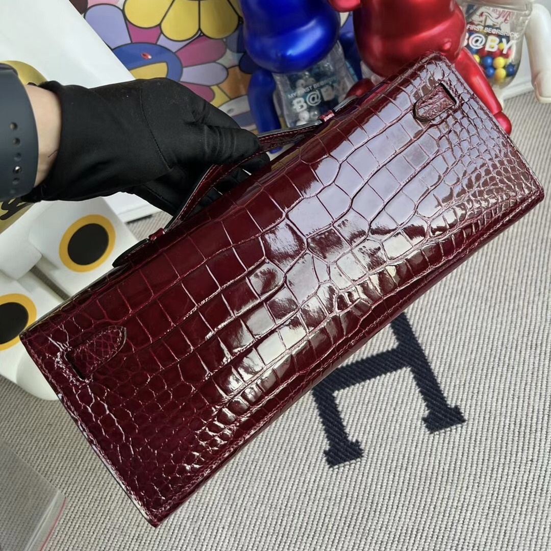HERMES KELLY CUT 31CM F5 BOURGOGNE GHW SHINY POROSUS CROCODILE HERMES KELLY CUT 31CM F5 BOURGOGNE GHW SHINY POROSUS CROCODILE
