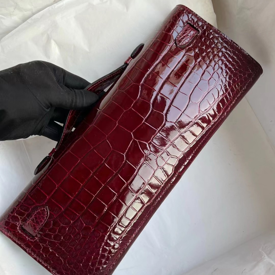 HERMES KELLY CUT 31CM F5 BOURGOGNE GHW SHINY POROSUS CROCODILE HERMES KELLY CUT 31CM F5 BOURGOGNE GHW SHINY POROSUS CROCODILE