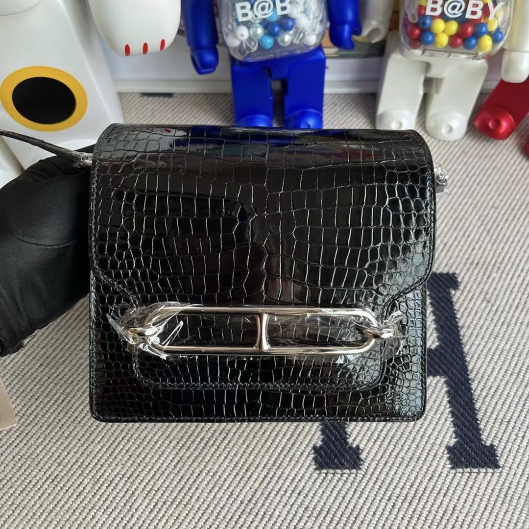 Hermès Roulis Mini 18 Shiny Porosus Crocodile Noir phw Hermès Roulis Mini 18 Shiny Porosus Crocodile Noir phw