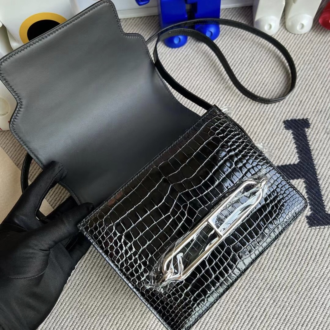 Hermès Roulis Mini 18 Shiny Porosus Crocodile Noir phw Hermès Roulis Mini 18 Shiny Porosus Crocodile Noir phw