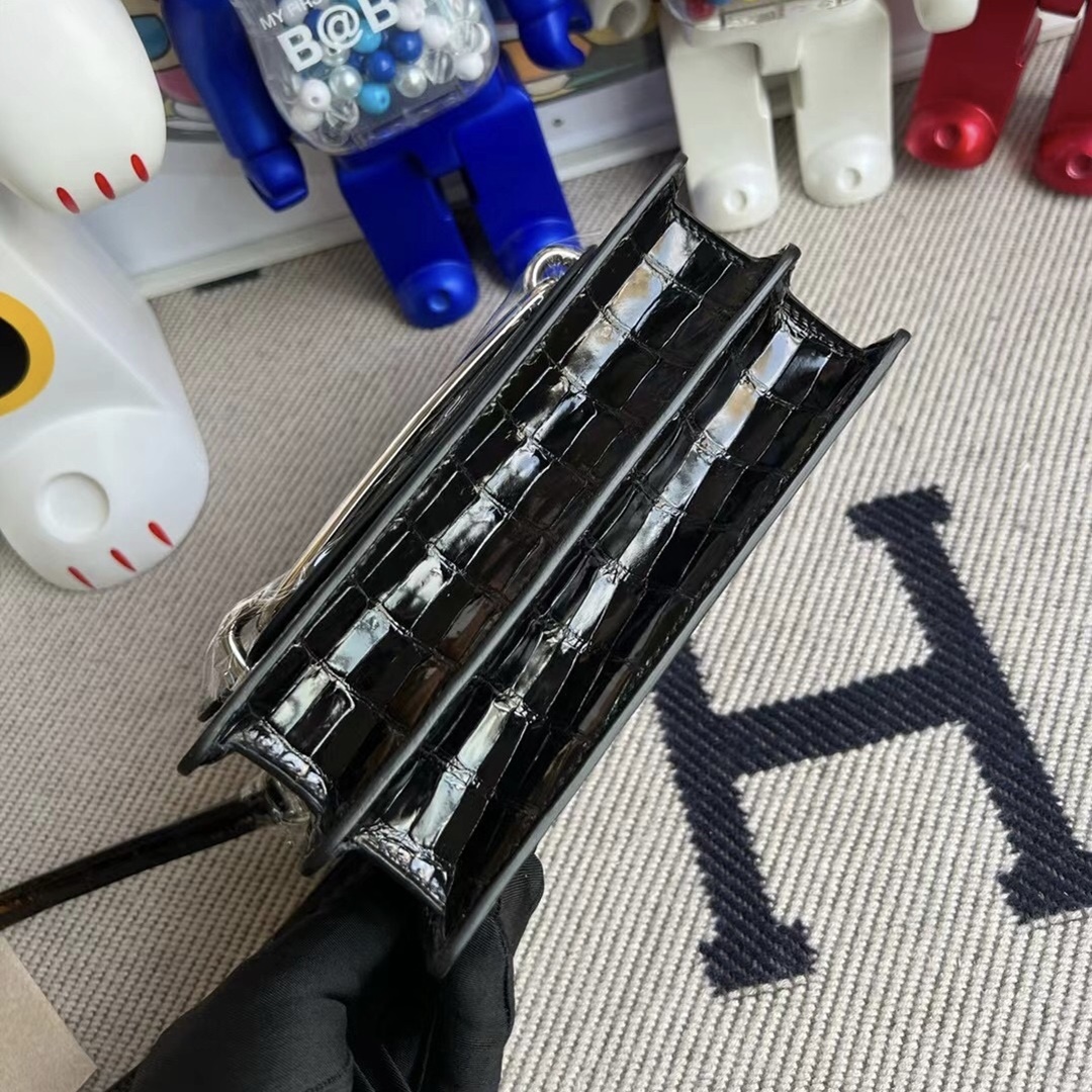 Hermès Roulis Mini 18 Shiny Porosus Crocodile Noir phw Hermès Roulis Mini 18 Shiny Porosus Crocodile Noir phw