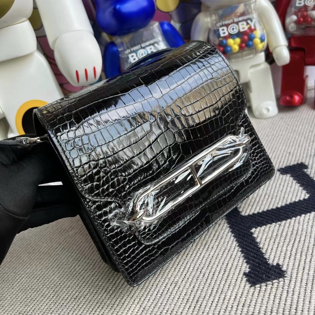 Hermès Roulis Mini 18 Shiny Porosus Crocodile Noir phw Hermès Roulis Mini 18 Shiny Porosus Crocodile Noir phw