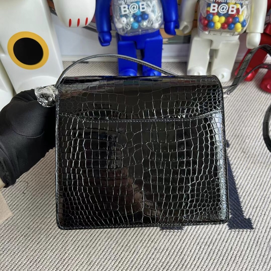 Hermès Roulis Mini 18 Shiny Porosus Crocodile Noir phw Hermès Roulis Mini 18 Shiny Porosus Crocodile Noir phw