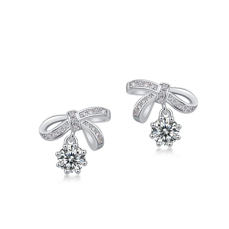 The new bow-shaped Moissanite earrings for women, S925, are silver inlaid with dazzling colored gemstones, presenting a light luxury and fashionable look