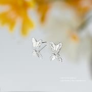 Aobao S999 pure silver exquisite fashion light luxury butterfly stud earrings versatile commuter niche design sense ear piercing earrings