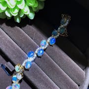 On the new 925 silver inlaid natural Australian color treasure bracelet fire color more live supply a generation of hair