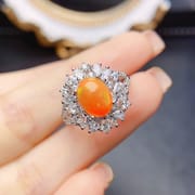 Factory wholesale explosions natural fire opal ring S925 silver inlaid main stone 7*9 hot Europe and the United States a generation of hair