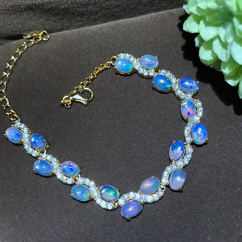 On the new 925 silver inlaid natural Australian color treasure bracelet fire color more live supply a generation of hair