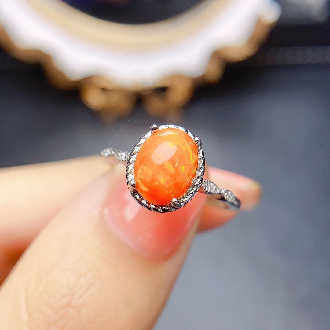 Factory wholesale explosions natural fire opal ring S925 silver inlaid main stone 7*9 hot Europe and the United States a generation of hair