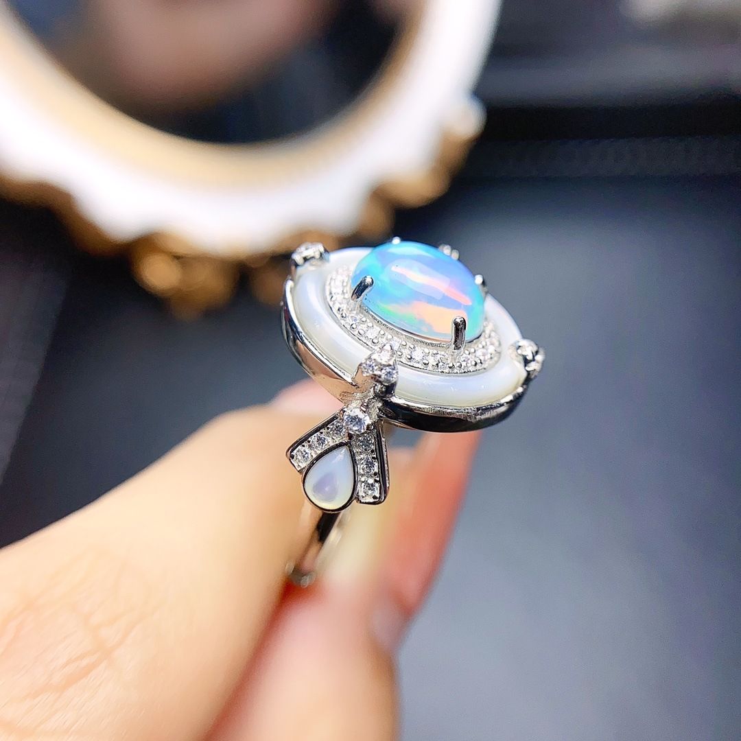 Factory wholesale explosions natural white opal ring S925 silver inlaid main stone 7*9 selling Europe and the United States a generation of hair