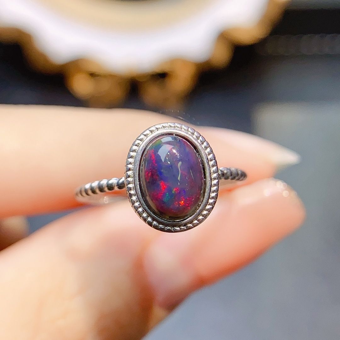 Factory wholesale explosions natural black opal ring S925 silver inlaid main stone 6*8 selling Europe and the United States a generation of hair
