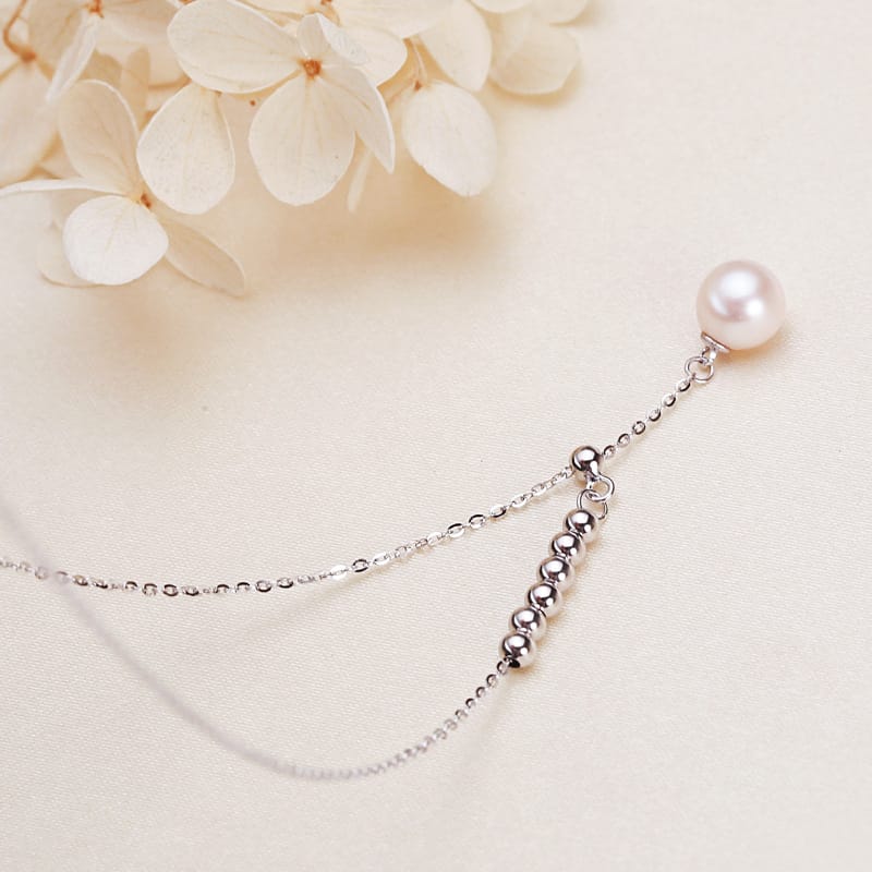 7mm white round pearl 6+1 white gold Y silver neck
