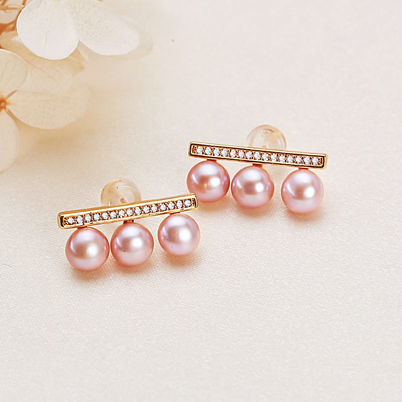 Balance beam purple pearl stud earrings