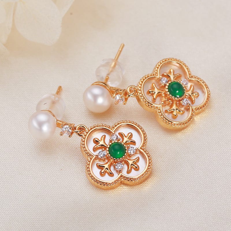 Snowflake + green dot earrings