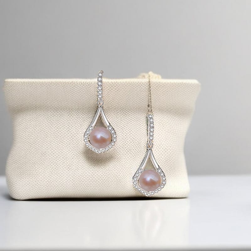 Cherish earrings for life (white gold + pink pearl