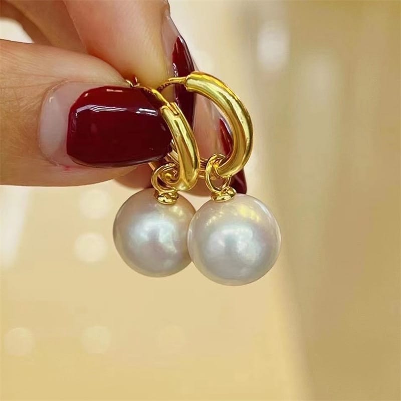 Natural pearl earrings (perfect round with slight 