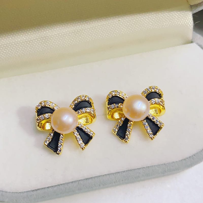 Bow earrings black (orange pink beads)