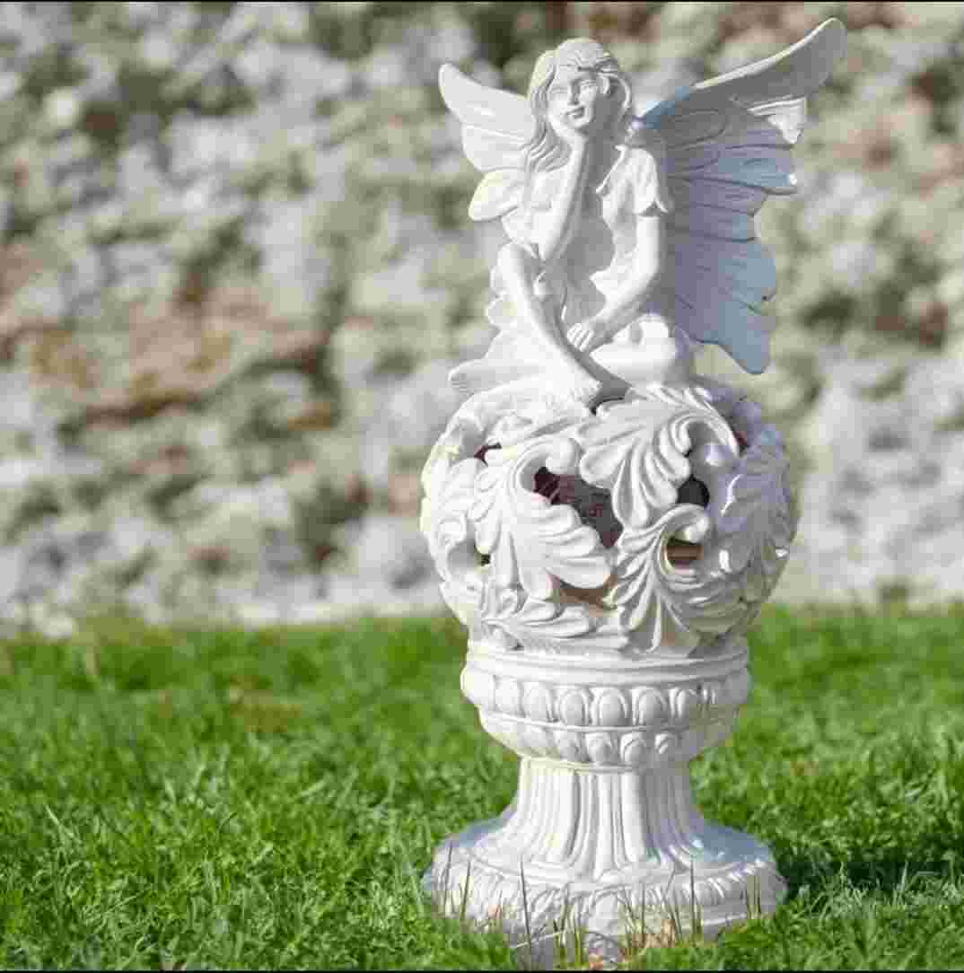 solar-powered-seated-angel-garden-statue.jpg