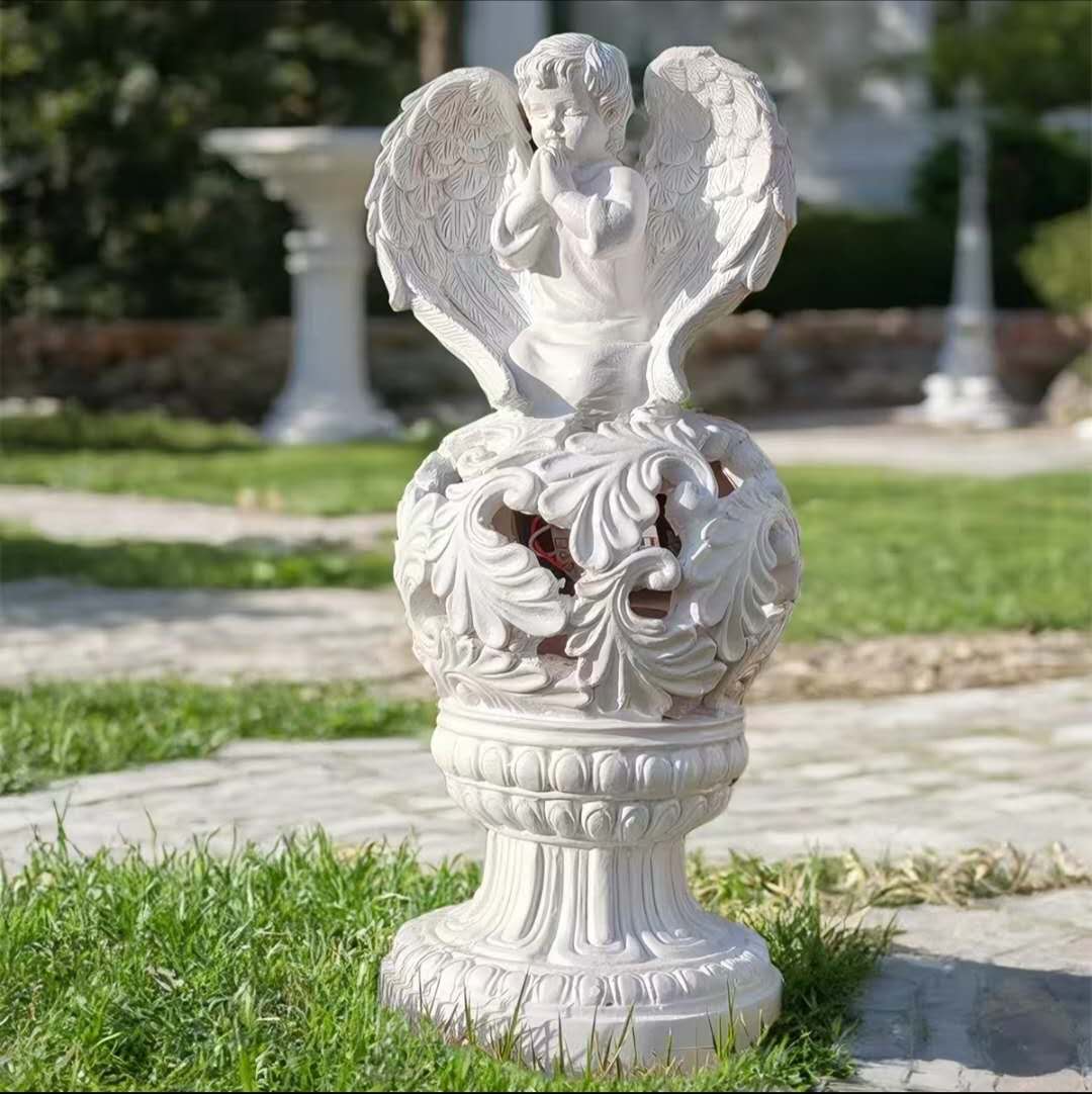 solar-powered-praying-cherub-garden-statue.jpg