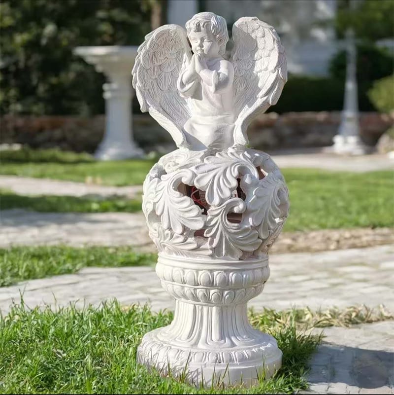 solar-powered-praying-cherub-garden-statue.jpg