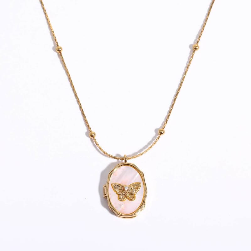 Gold butterfly mother of pearl locket
