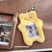 Sleepy yellow star plush bear keychain with a clear window for displaying photocard.