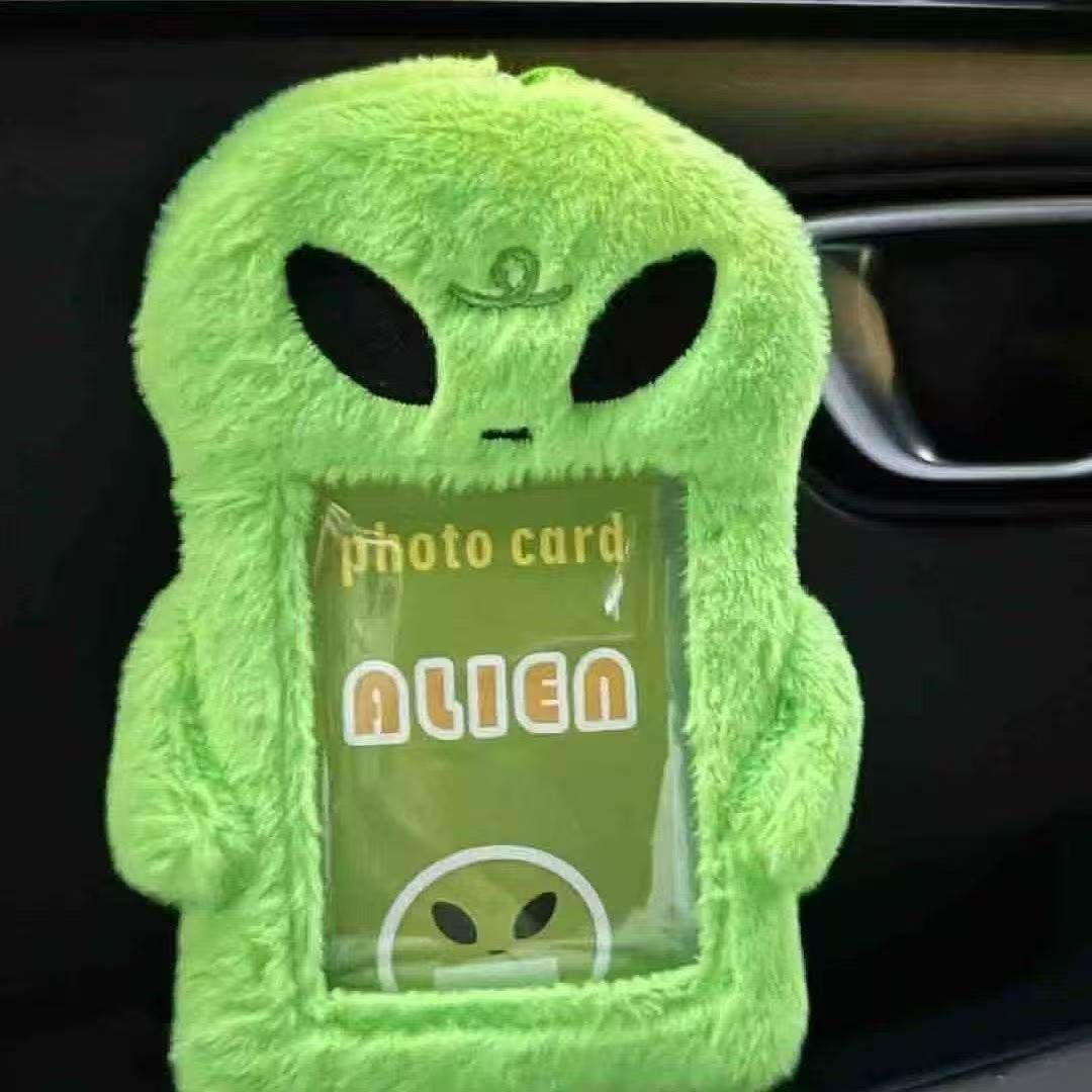 Neon green fluffy alien plush card holder for Kpop photocard and ID badge.