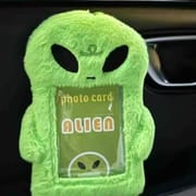 Neon green fluffy alien plush card holder for Kpop photocard and ID badge.