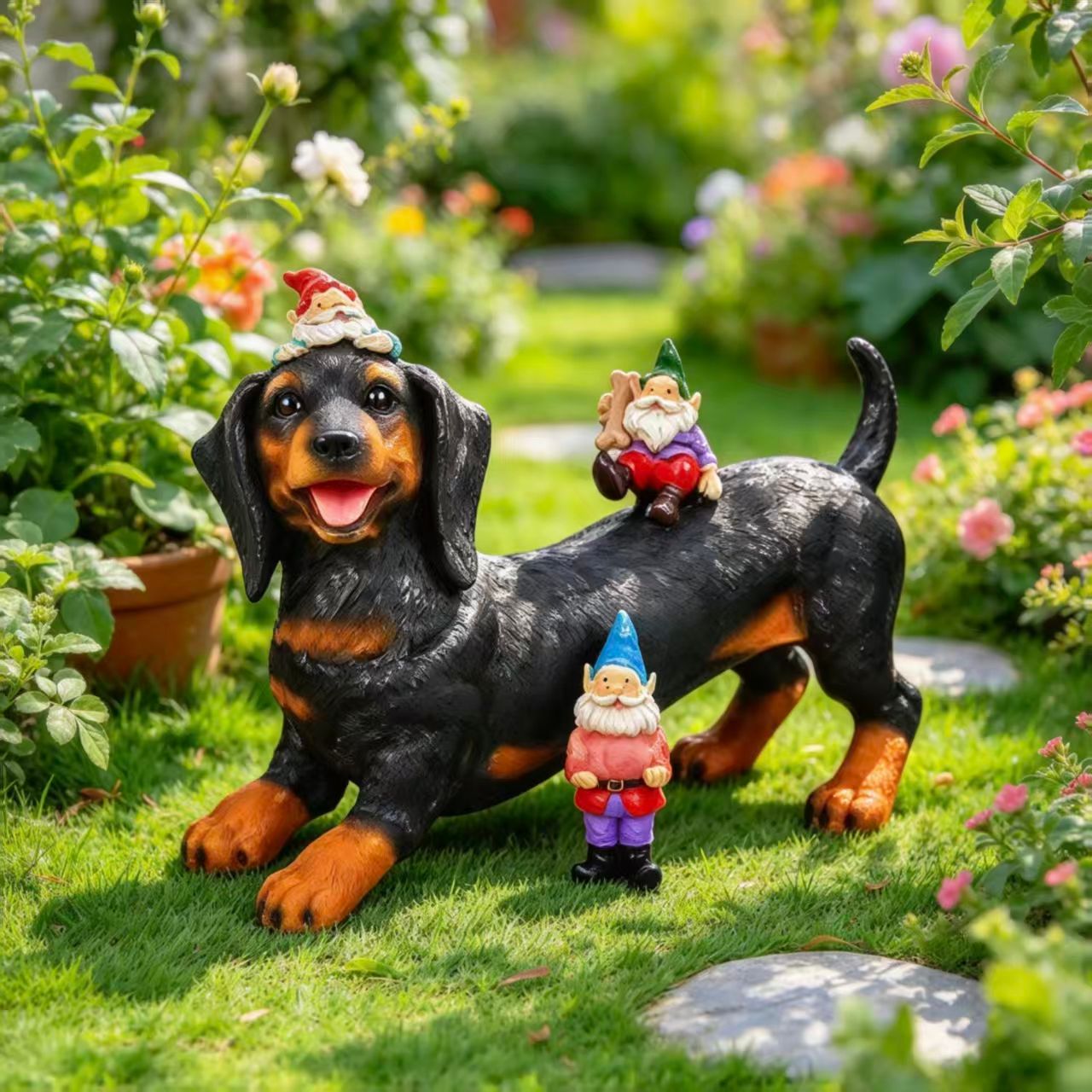 Resin dachshund garden statue with decorative gnome figures