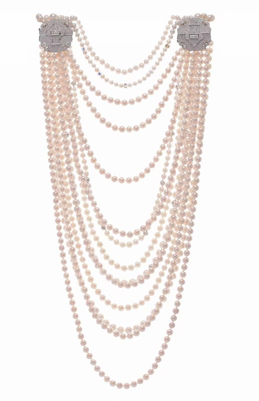 Double-sided multi- strand design pearl diamond necklace . 