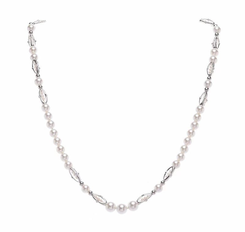 White and gold diamond missile pearl necklace