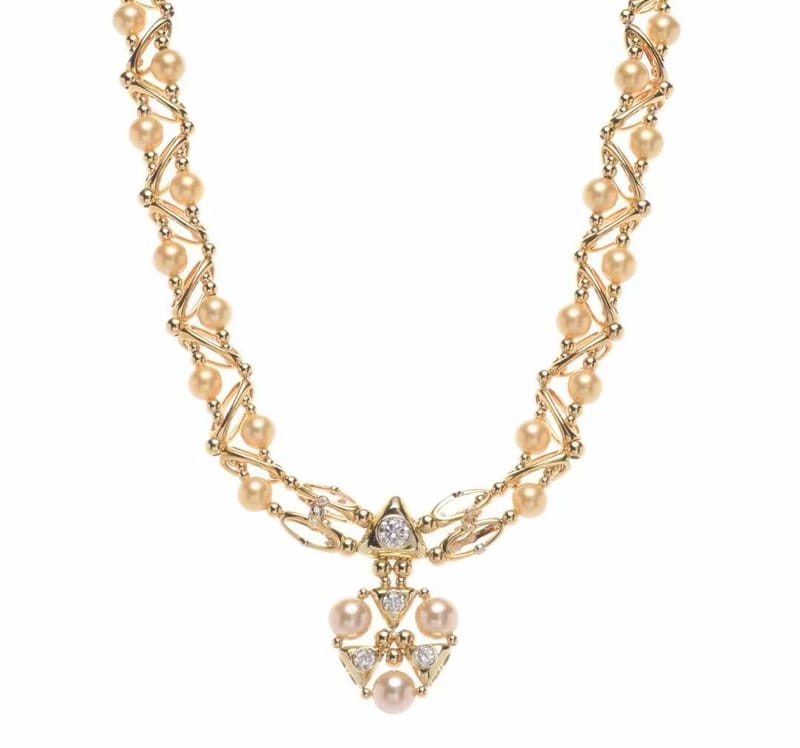 Golden diamond missile spaceship necklace