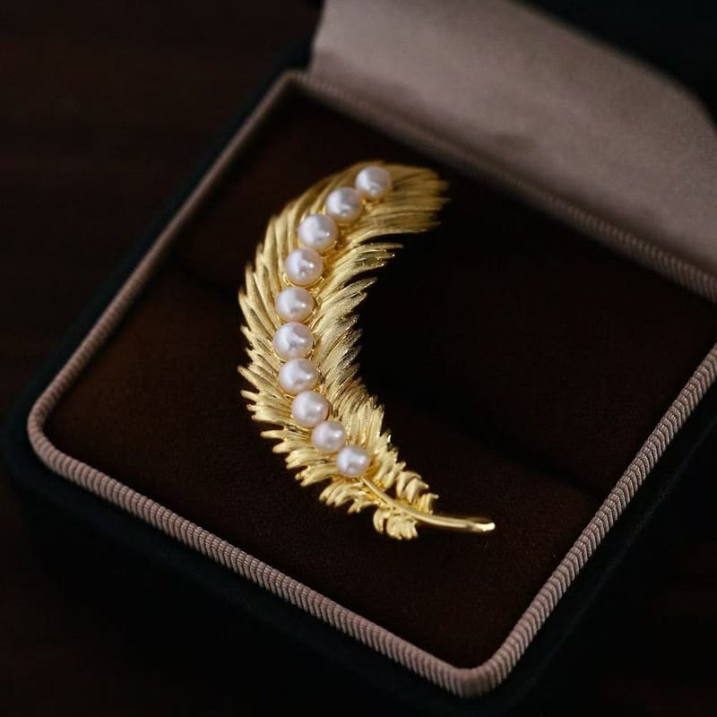 Golden feather pearl brooch