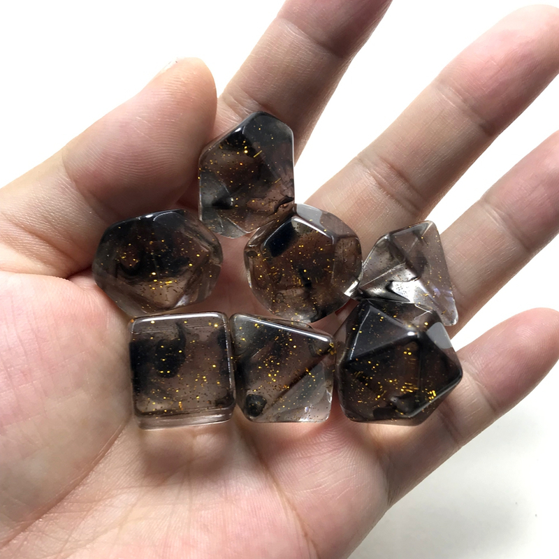 Gold glitter flakes with black glitter strands