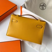 KELLY POCHETTE SWIFT 9D JAUNE AMBE GHW