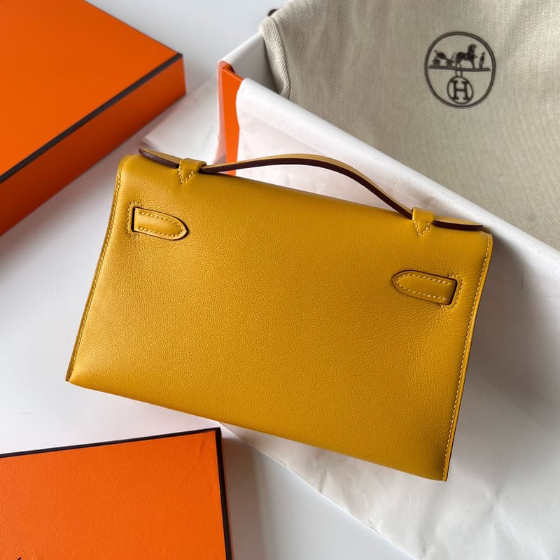 KELLY POCHETTE SWIFT 9D JAUNE AMBE GHW